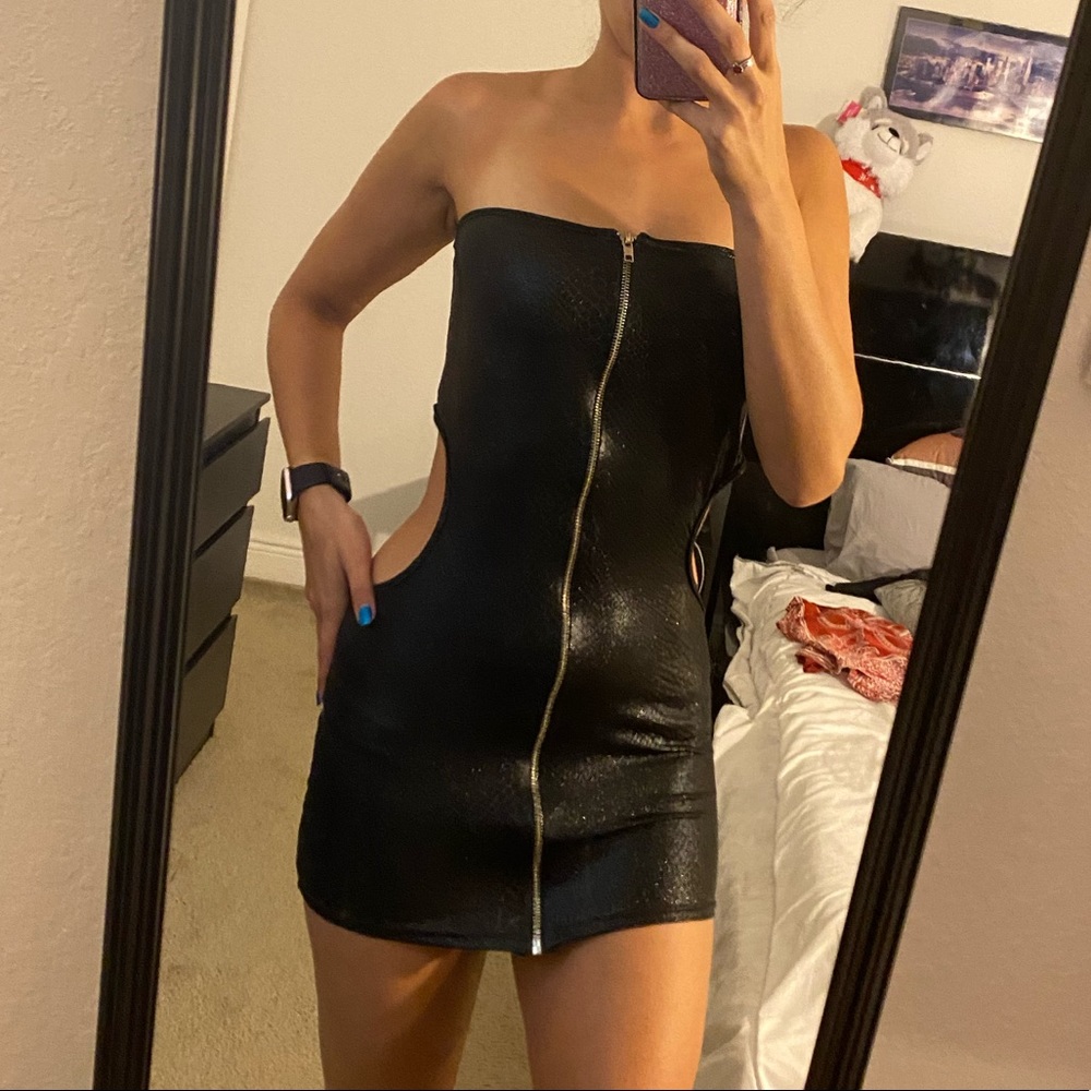 Black dress with front zipper and cut outs